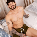 Pietro Duarte on bed in underpants